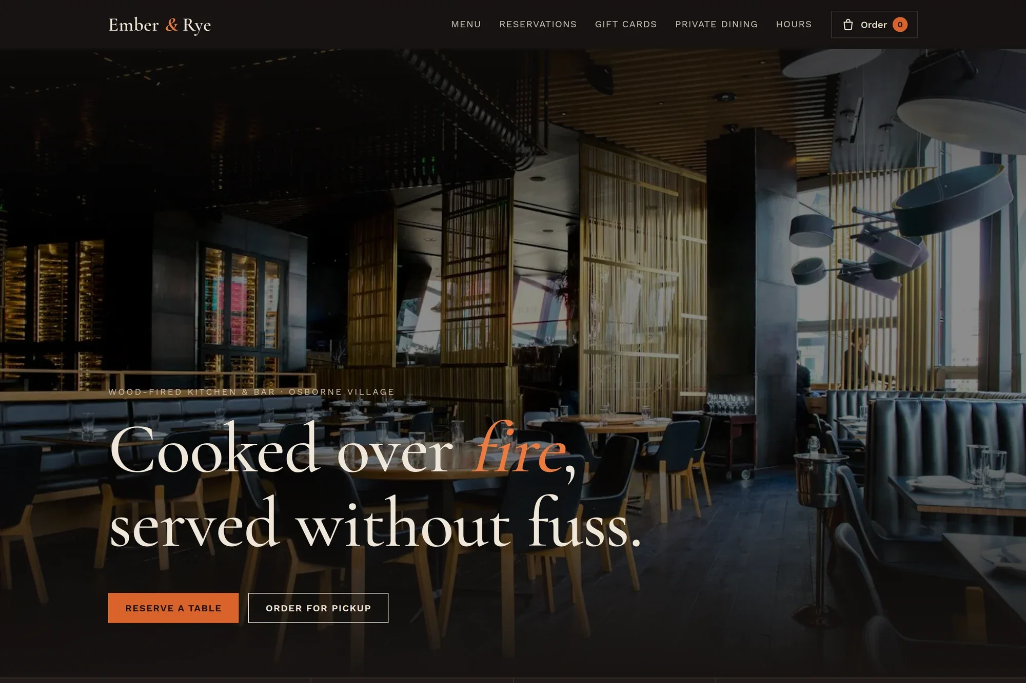 Ember & Rye restaurant home page with dark dining-room hero